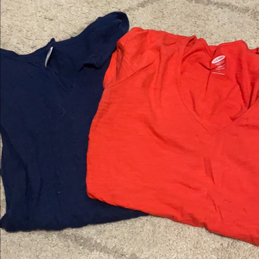2 maternity short sleeved shirts.